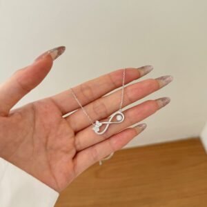 Sterling Silver "Eternal Wings" Infinity Necklace - View 3