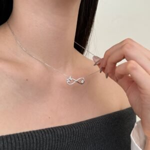 Sterling Silver "Eternal Wings" Infinity Necklace - View 4