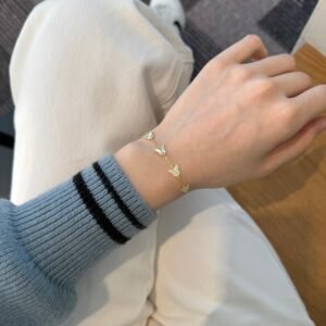 Grace in Gold – The 18K Gold-Plated Butterfly Essence Bracelet - View 4